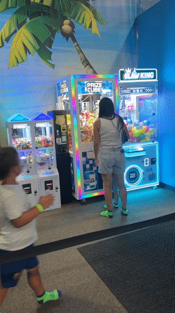 Arcade claw machines and prize setups at a Buffalo Grove venue