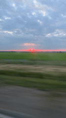 Sunset filmed from moving vehicle in Slobozia, Moldova