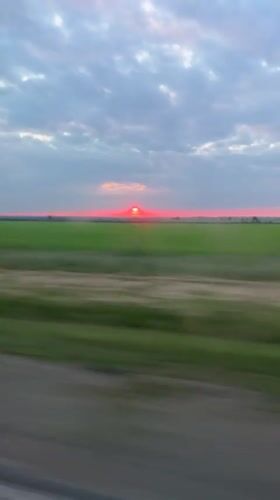 Sunset filmed from moving vehicle in Slobozia, Moldova