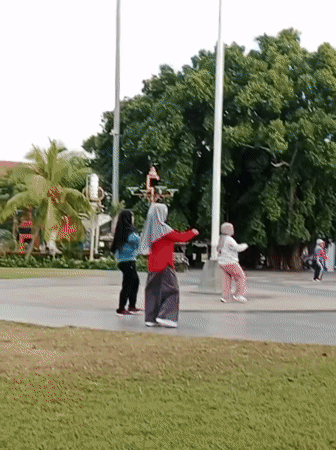 Group aerobics session in matching outfits, Kecamatan Pati