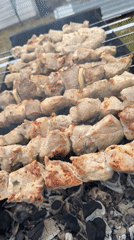 Outdoor barbecue cooking documented in Russian village