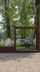 Woman on swing, craftsman mural spotted in Birobidzhan