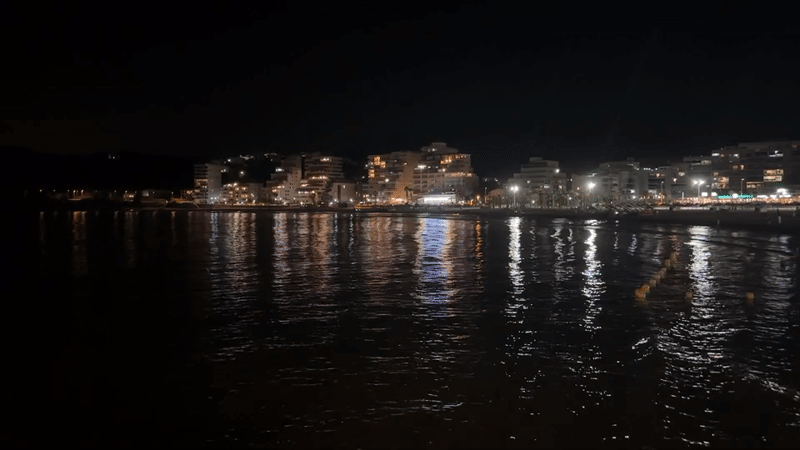 Quiet night at a Spanish beach town, shoreline and steps