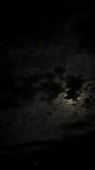 Dramatic cloudy skies obscure moon over Lovech, Bulgaria