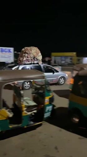 Evening street food market operates in Bukuru, Nigeria