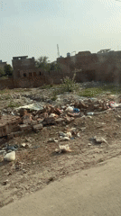 Driver documents ordinary street life in Nasheman Colony, Pakistan