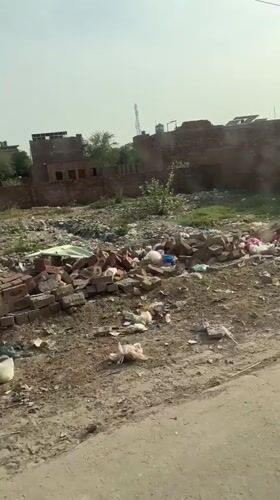 Driver documents ordinary street life in Nasheman Colony, Pakistan