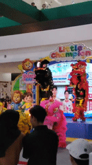 Lion dance performance fills a gymnasium in Banyurojo