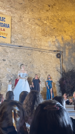 Multi-generational fashion show draws crowds in Calella, Spain