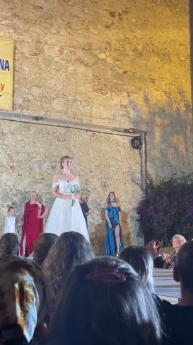 Multi-generational fashion show draws crowds in Calella, Spain