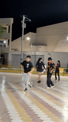 Night dancing gathering observed near Tacna's iconic arch