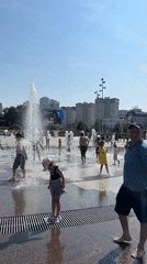 Perm plaza buzzes with summer crowds, splash pads, and street art