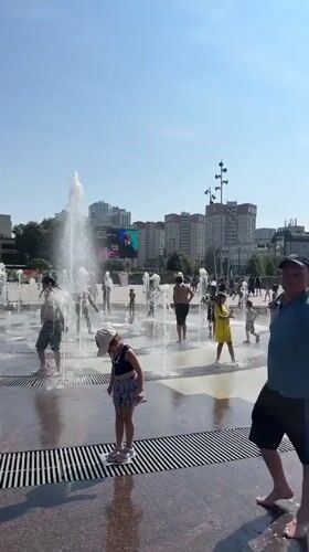 Perm plaza buzzes with summer crowds, splash pads, and street art