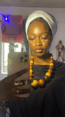 Woman documents traditional face paint ceremony in Ado, Nigeria