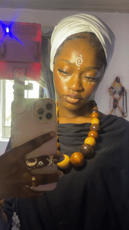Woman documents traditional face paint ceremony in Ado, Nigeria