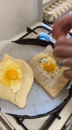 Georgian khachapuri preparation and serving in Milan kitchen