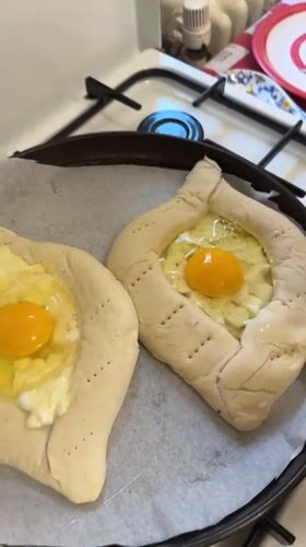 Georgian khachapuri preparation and serving in Milan kitchen