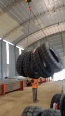 Warehouse crane operations and floor work in Malaysia