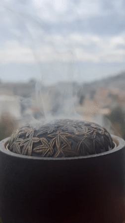 Morning coffee and croissant captured in Budva, Montenegro