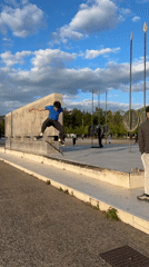 Skateboarder attempts tricks at Thessaloniki plaza, stumbles during maneuver