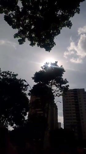 Evening street life documented in Caracas neighborhood
