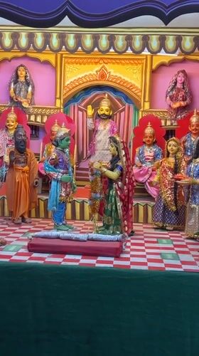 Hindu religious displays featuring deity figurines documented in Varanasi temples
