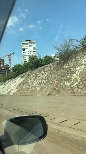 Roadside graffiti wall documented in Accra, Ghana