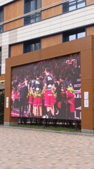 Moscow public square hosts outdoor basketball viewing with seating area