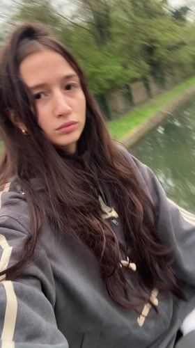 Woman in athletic wear photographed on bridge in Goffs Oak