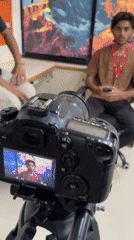 Pune street draped in orange fabric, cameras rolling