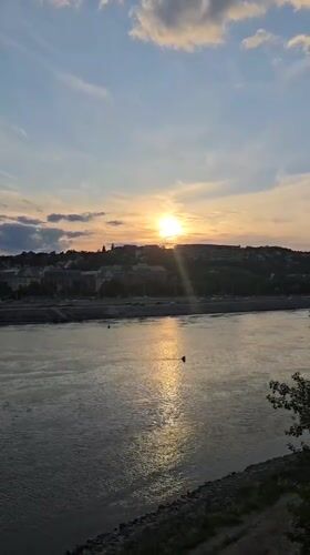 Evening scenes captured along Budapest's Danube River and dining areas