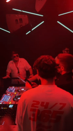 DJ performs at packed Patong nightclub under red lights