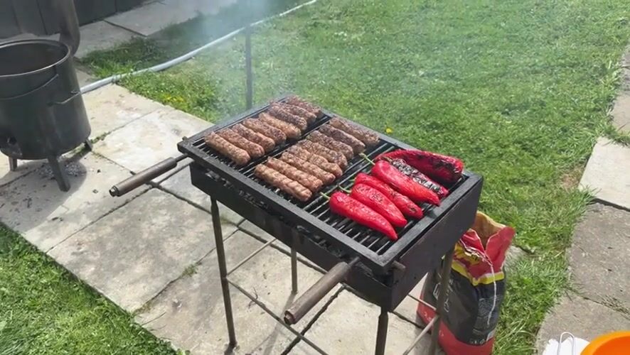 Morning backyard barbecue documented in Valea Izvoarelor, Romania