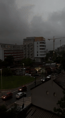 Rainy afternoon traffic observed at Belgrade crossroad