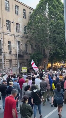 Demonstration with multiple flags marches through Tbilisi streets