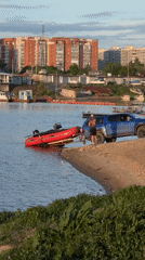 Family waterside recreation documented in Khabarovsk, Russia