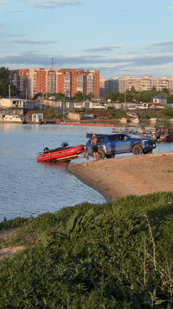 Family waterside recreation documented in Khabarovsk, Russia