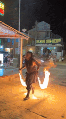 Fire performers and fireworks light up Phu Thuy Ward at night