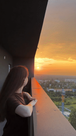 Sunset over Kyiv seen from high-rise vantage points