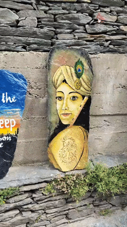 Spiritual art and carvings documented along Bhagsu mountain paths