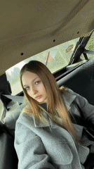 Woman passenger observed in moving car in Chaikovsky, Russia