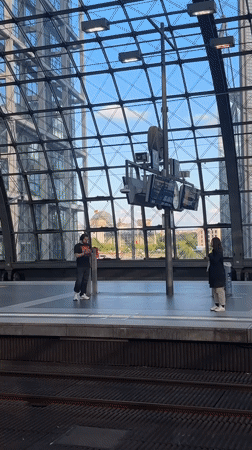 Evening commuters gather as DB train arrives Berlin station