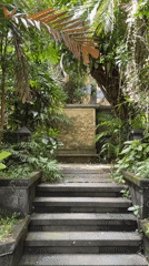 Tourist documents traditional Indonesian garden architecture in Kuta Selatan