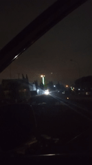 Late-night road scenes in Aso, Nigeria, featuring traffic and billboards