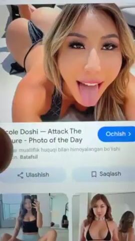 The video shows a hand scrolling through Google Images search results for "Nicole Doshi". The search results display several images of the woman in various revealing outfits. The search interface includes options to share or save the images. The search query, image titles, and site attributions are in English. Some of the text around the images is in another language, likely Uzbek.