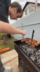 Backyard barbecue gathering documented in Chaikovsky, Russia