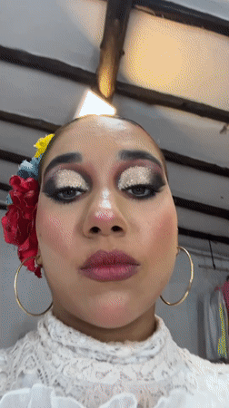 Performers prepare backstage for cultural event in Porlamar, Venezuela