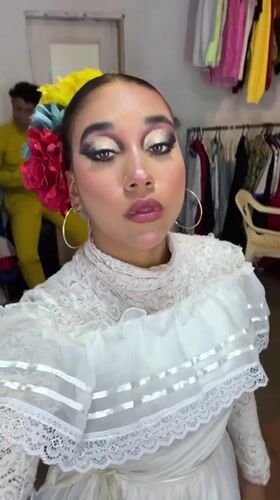 Performers prepare backstage for cultural event in Porlamar, Venezuela