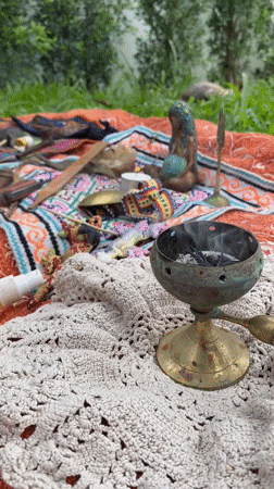 Outdoor altar with burning incense observed on Koh Phangan