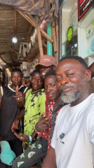 Nigerian market vendors sell fresh produce in Lekki, Ado